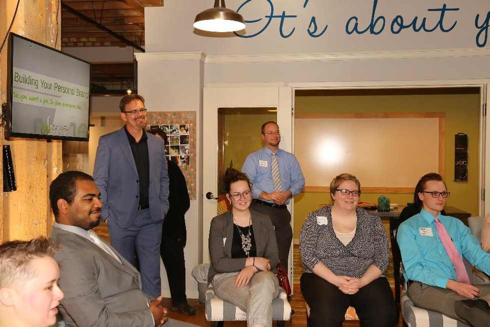 Alumni sitting in group for workshop